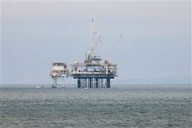 An offshore oil rig platform is photographed in Huntington Beach, California, U.S. July 4, 2024. REUTERS/Etienne Laurent/File Photo