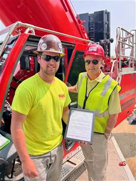 Eric Prenzler receiving SCRA operator safety award from Jeff McNally