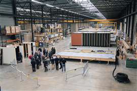 Skilpod CEO Filip Timmermans led a factory tour of the company he founded to explain how modular is acclerating the construction of social housing in Flanders.