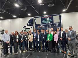 AZETEC project collaborators are pictured in front of the prototype at the AMTA Industry Innovations Expo. (Photo: AMTA)